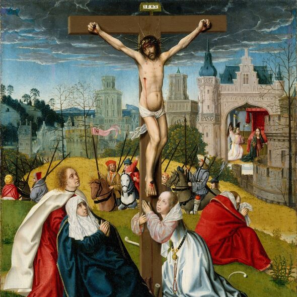 Jesucristo cuelga en la cruz.