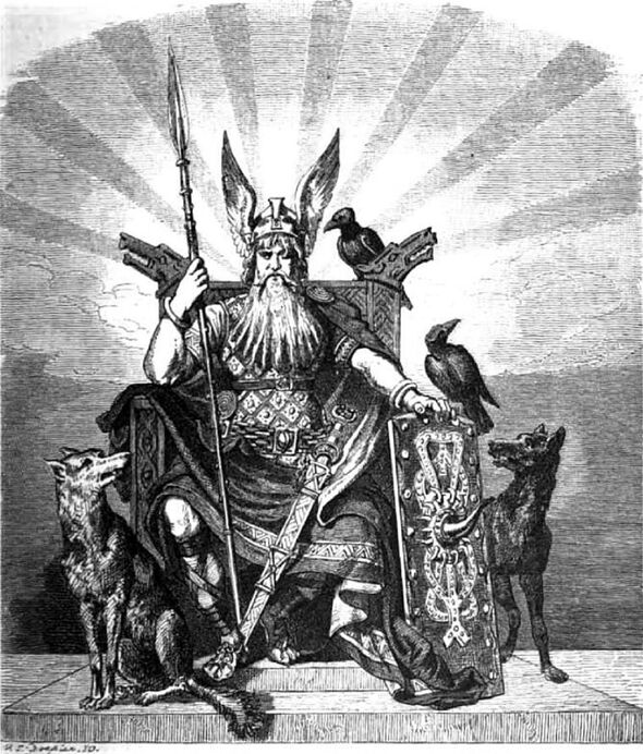 El dios nórdico Odin con su cuervo Huginn