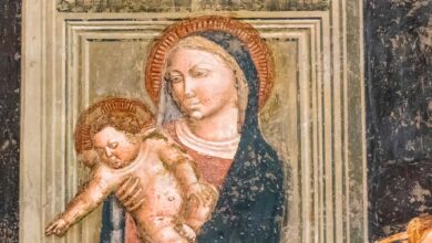 Fresco depicting the Virgin Mary holding Baby Jesus. Source: Giorgio G / Adobe Stock.