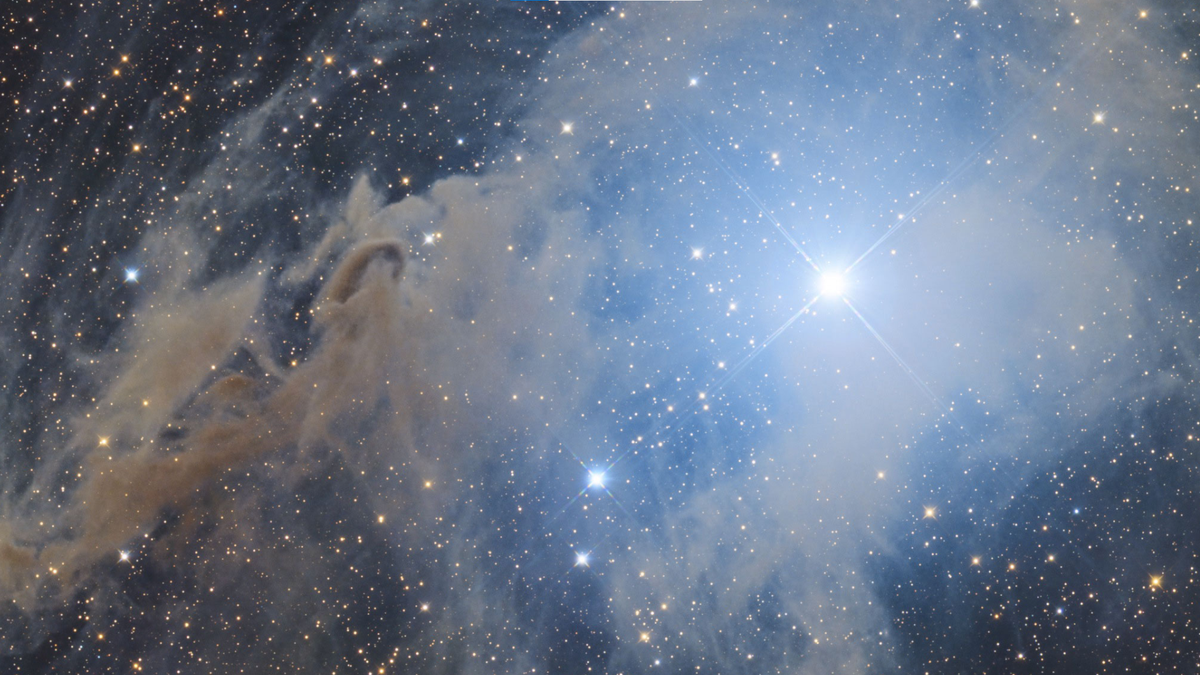 Foco de la NASA: Nebulosa oscura y estrellas en la foto astronómica del día 5 Chang Lee